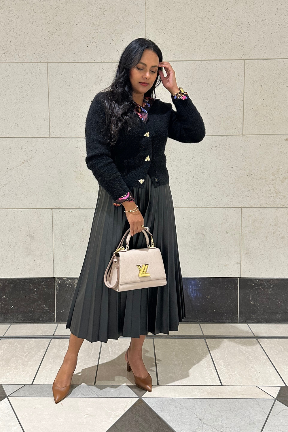 Black Cardigan outfit with leather skirt and printed shirt