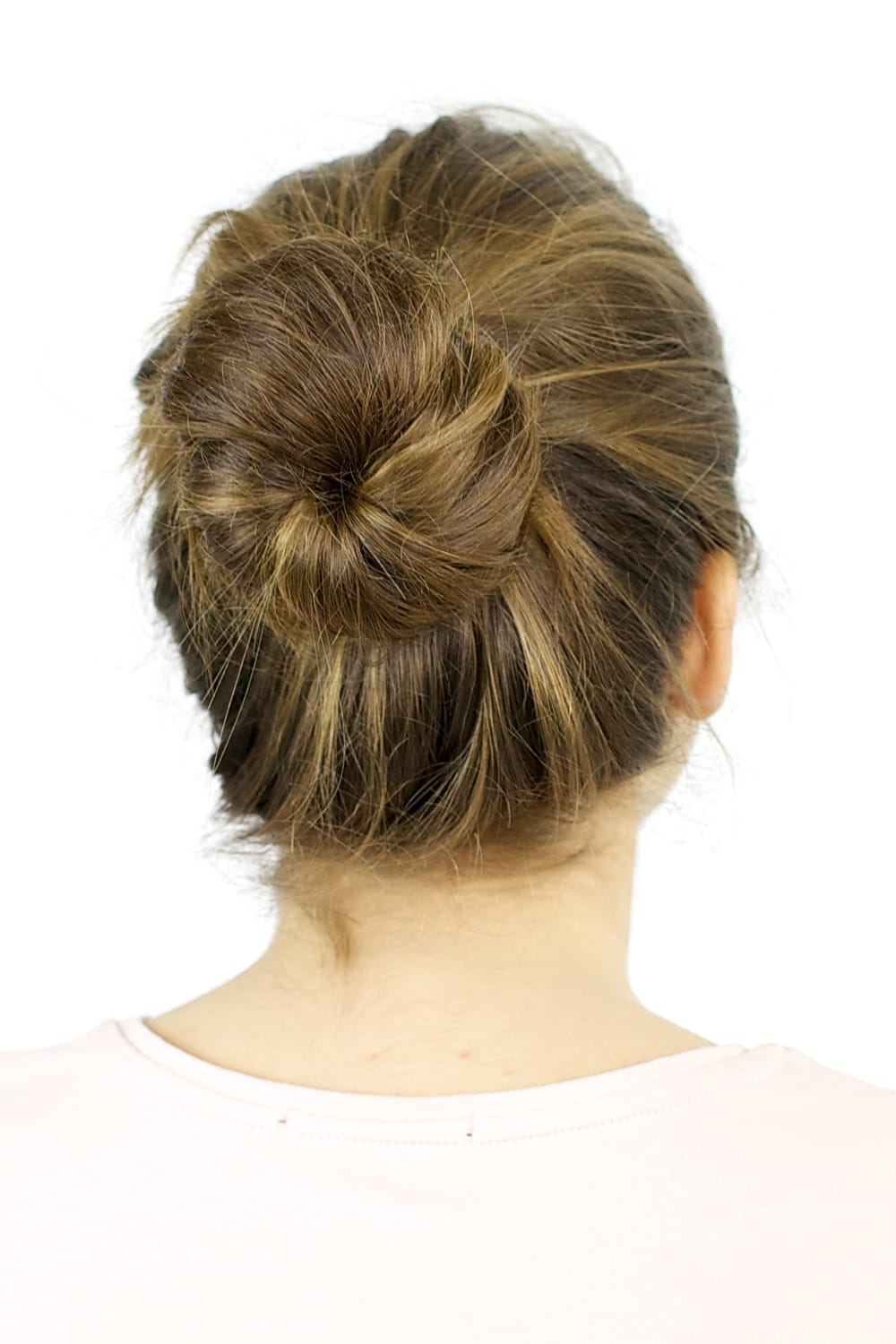 how to refresh hair after workout - tie hair in a bun