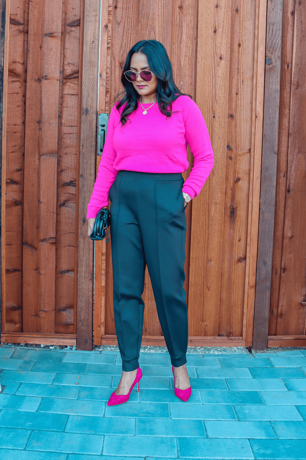 Fuchsia sweater and joggers holiday outfit