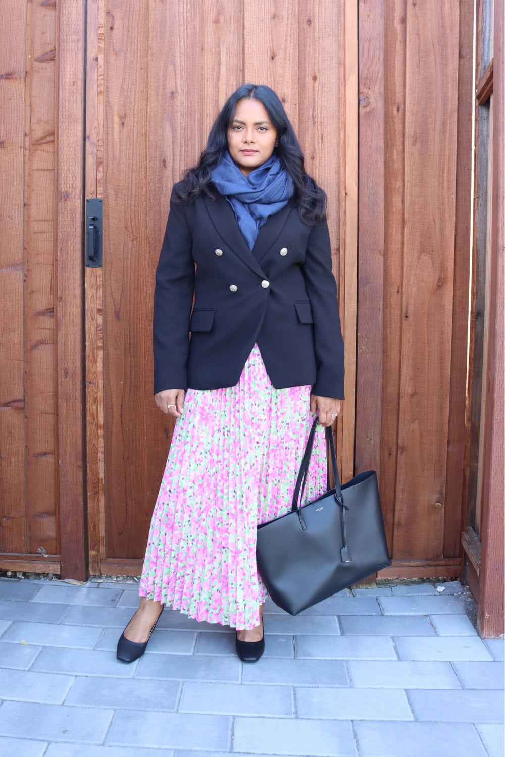 Pleated skirt outfit with black blazer