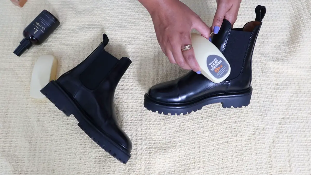 Applying Leather conditioner to leather boots