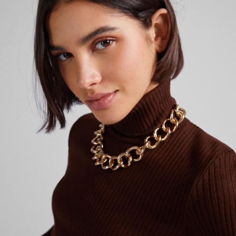 Chunky necklace with fitted turtleneck
