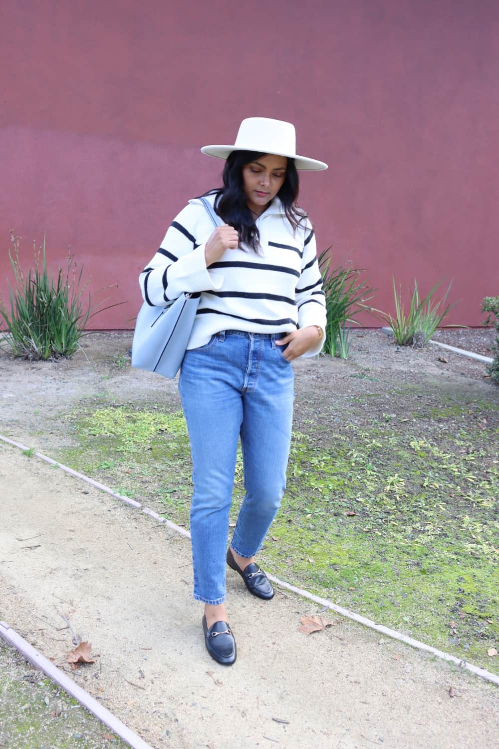 Fedora hat outfit with Navy Striped Sweater, Narrow Jeans and Loafers