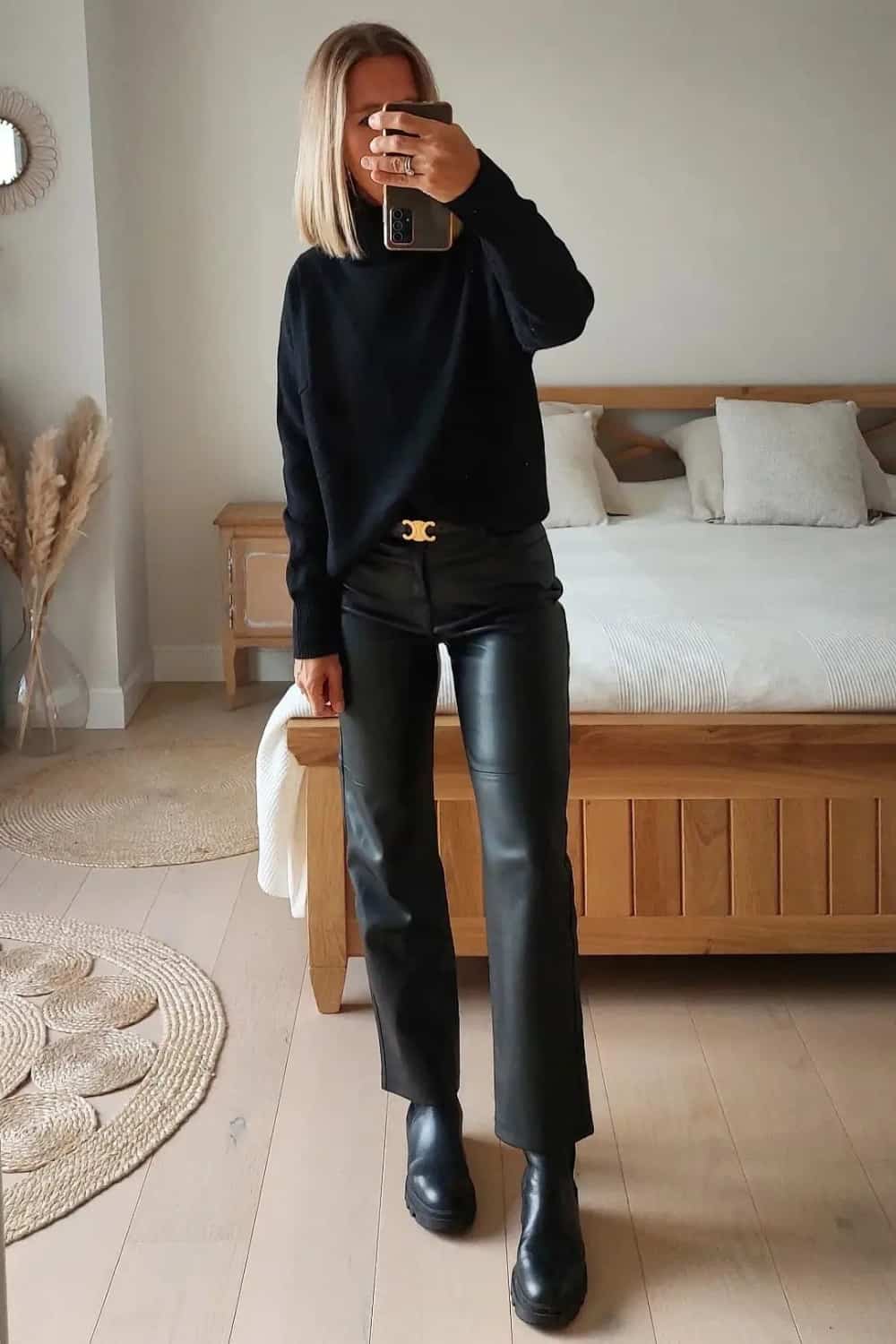 Black turtleneck Sweater outfit with Leather Pants