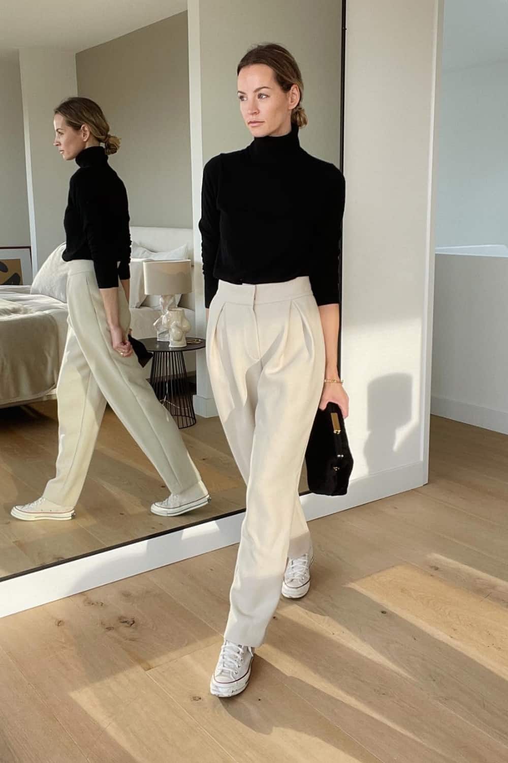 Black turtleneck sweater outfit with pants and sneakers
