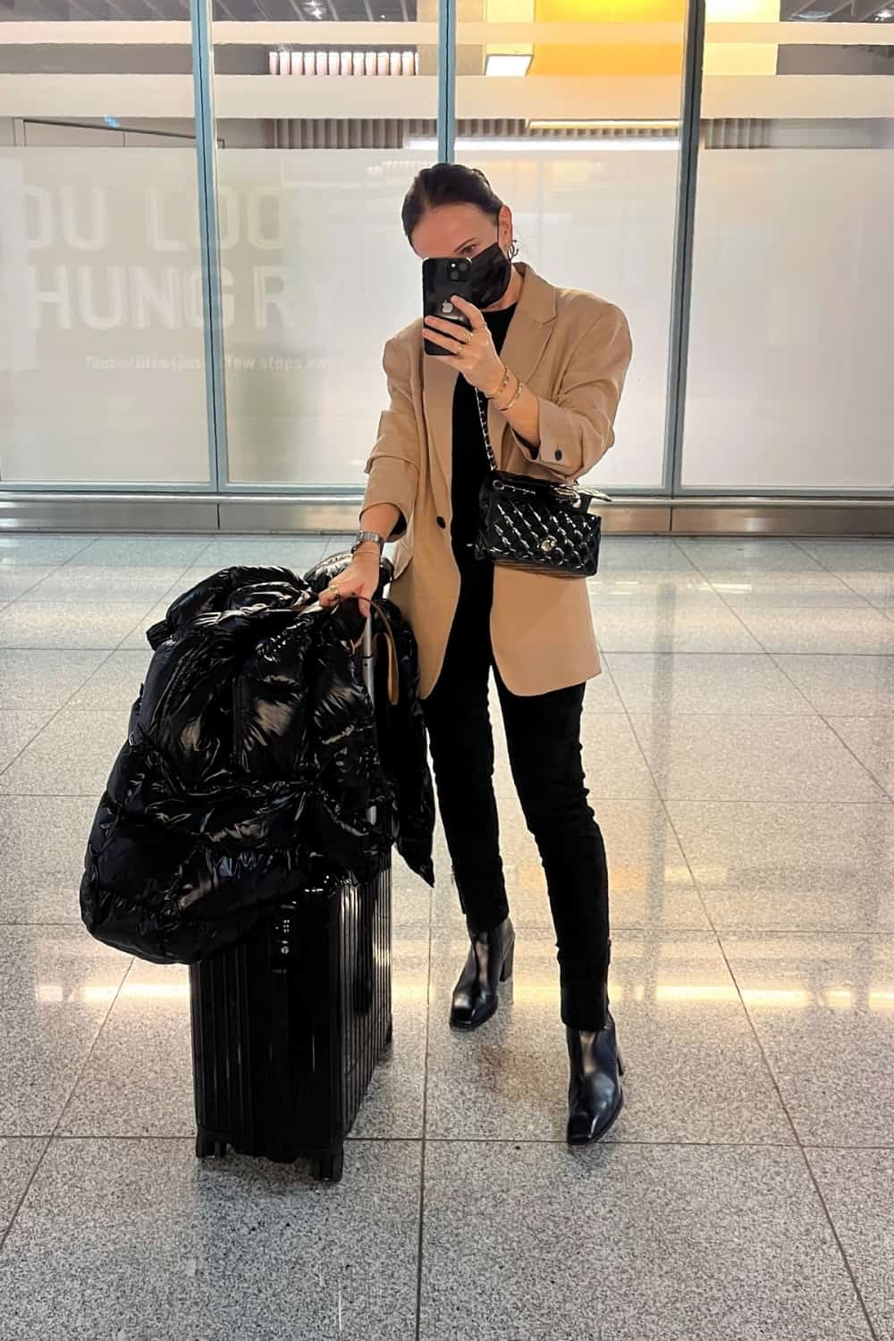 Winter Airplane outfit with jeans and blazer