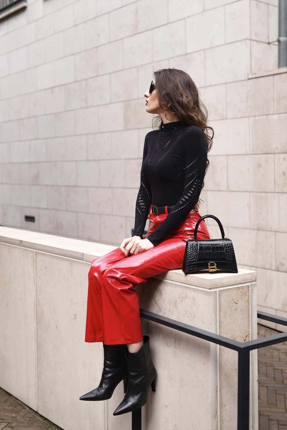 Red pants with black bodysuit