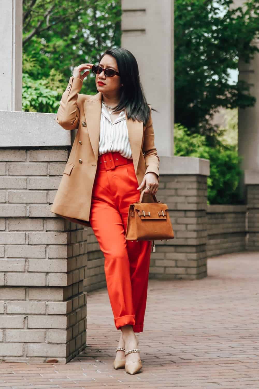 Red pants outfit with camel blazer