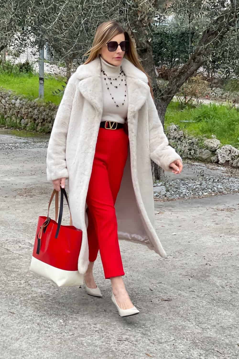 Red pants outfit with faux fur coat