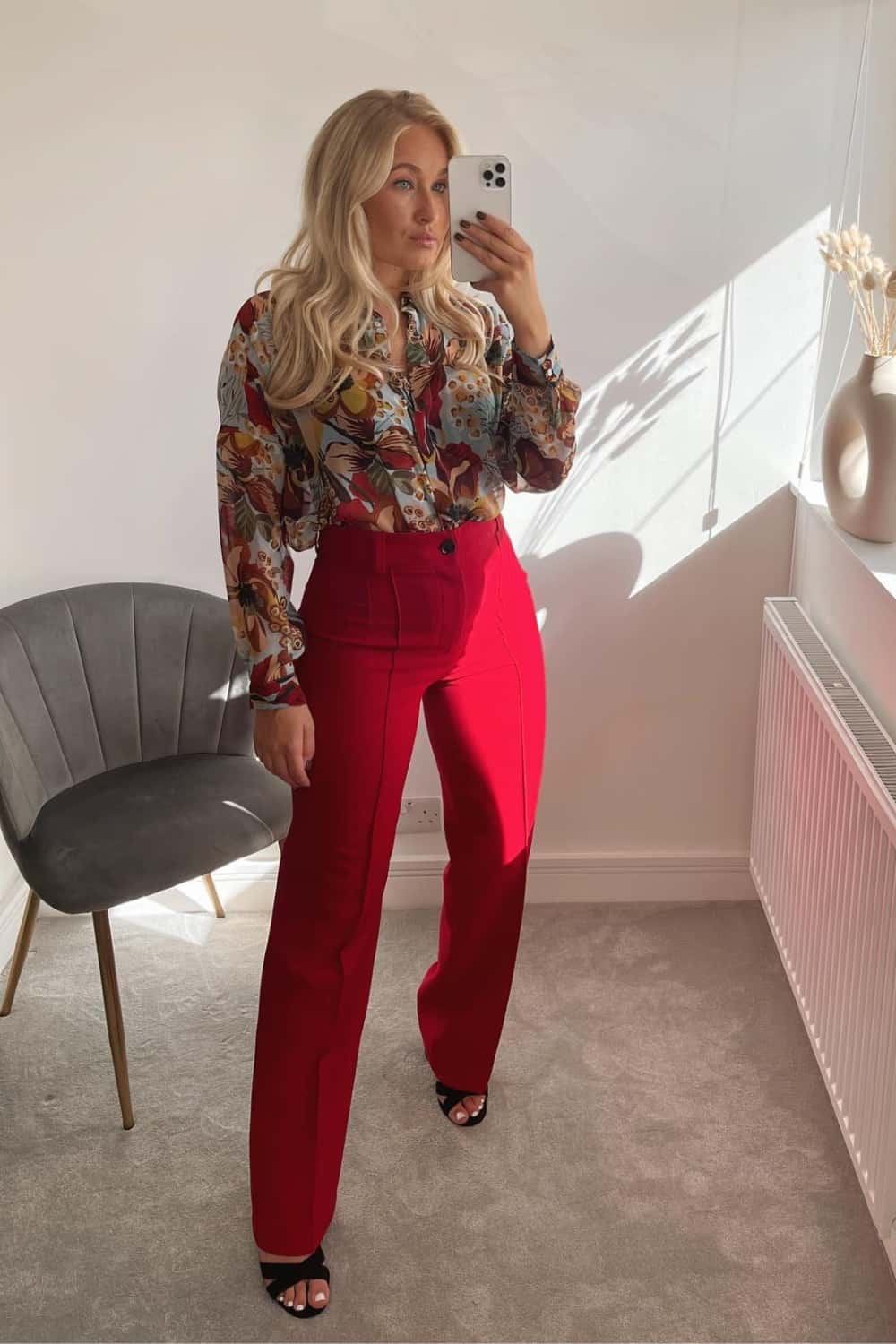 Red pants outfit with printed top