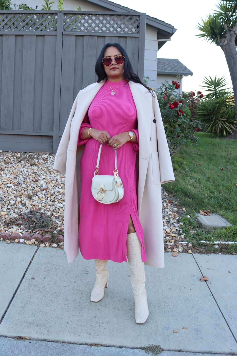 Classy Fuchsia outfit with Fuchsia sweater Dres white coat and boots