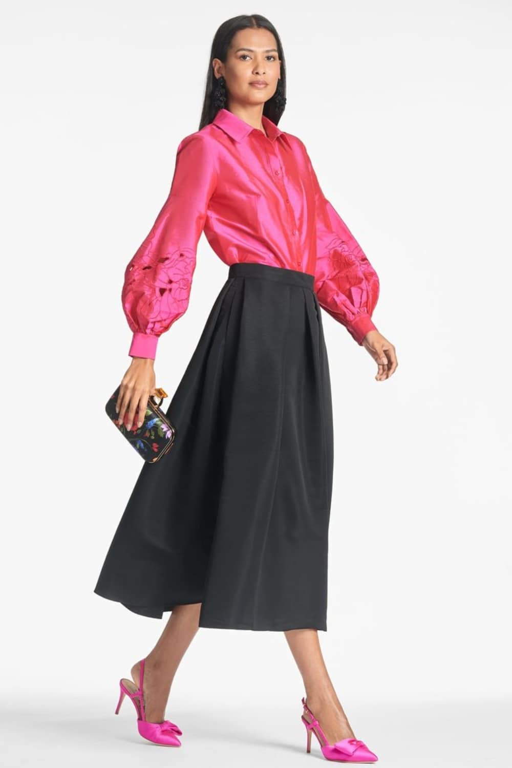 Fuchsia button down shirt with black pleated skirt outfit