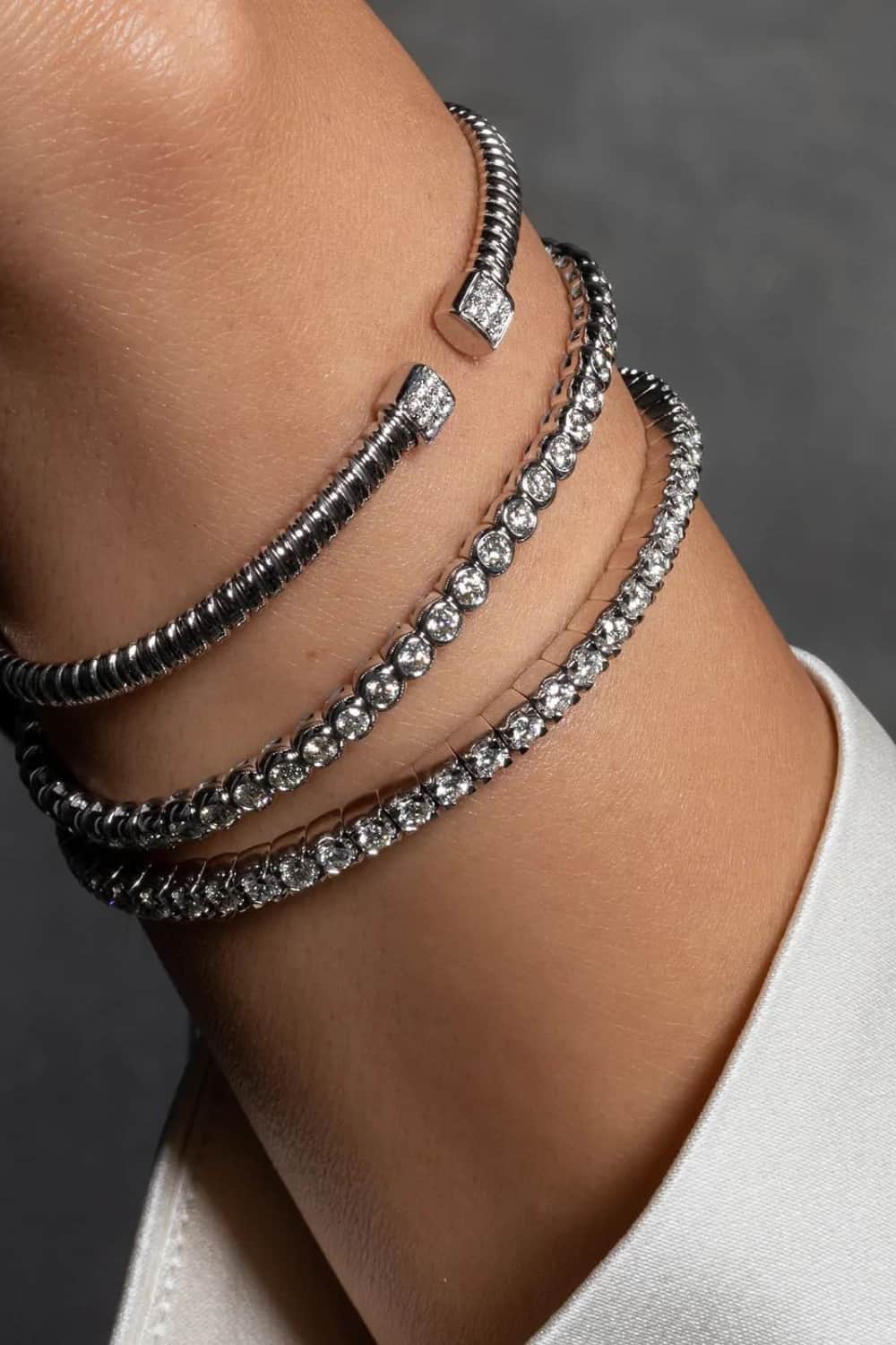Stack diamond and silver bracelets together