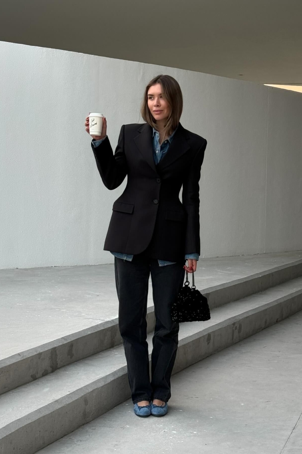 Black blazer with jeans and denim shirt outfit for work