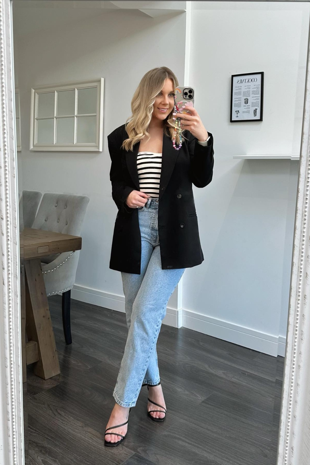 Black blazer with jeans and striped tee outfit for work