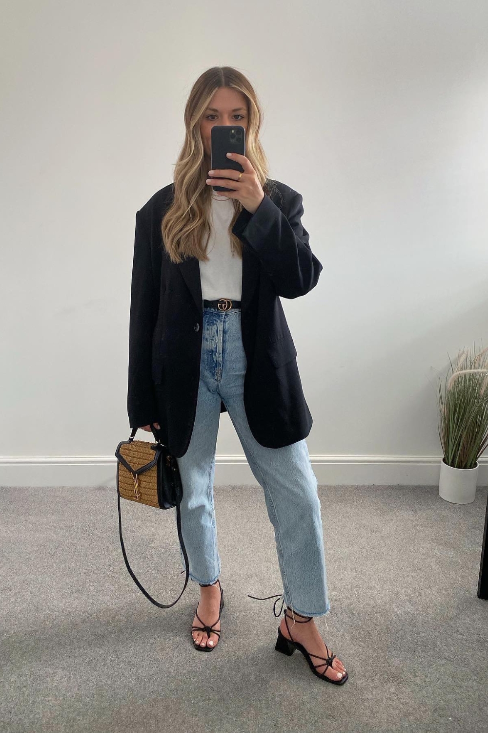 Black Blazer with jeans and strappy sandal outfit for work
