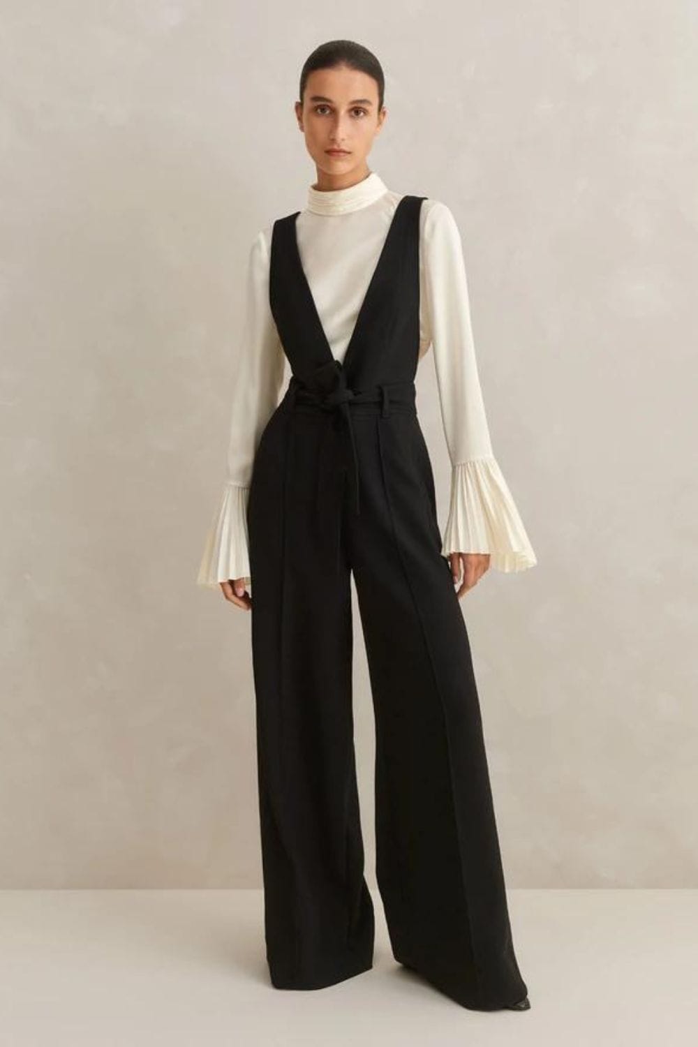 What to wear to opera with Deep V Layering Jumpsuit + Belt + Pumps