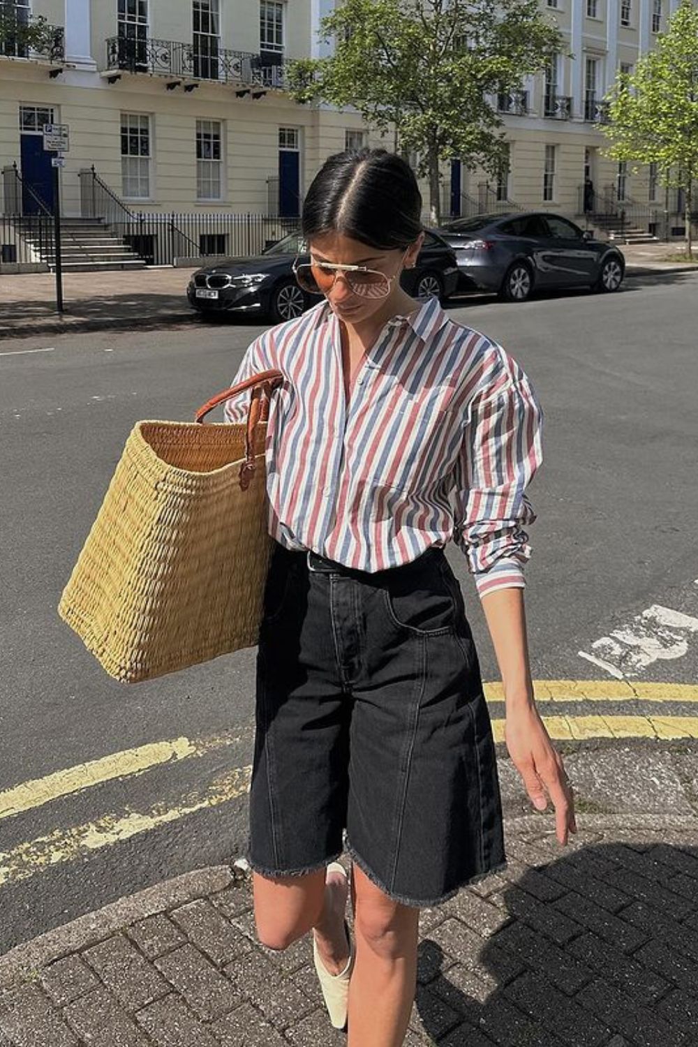 classy-shorts-outfit-Striped-Blouse-Paired-with-Smart-Black-Shorts